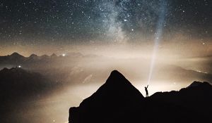 Preview wallpaper silhouette, starry sky, lighting, mountains