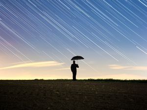 Preview wallpaper silhouette, starry sky, long exposure, movement, field