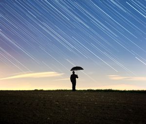 Preview wallpaper silhouette, starry sky, long exposure, movement, field