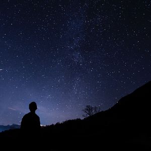 Preview wallpaper silhouette, starry sky, man, night