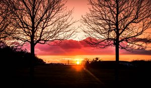 Preview wallpaper silhouette, sunset, alone, solitude, horizon