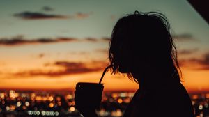 Preview wallpaper silhouette, sunset, night city, solitude