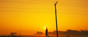 Preview wallpaper silhouette, sunset, pole, wires, walk