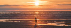 Preview wallpaper silhouette, sunset, sea, coast, horizon, lonely