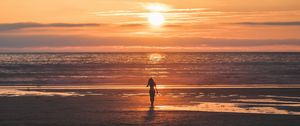 Preview wallpaper silhouette, sunset, sea, coast, horizon, lonely