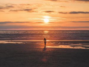 Preview wallpaper silhouette, sunset, sea, coast, horizon, lonely