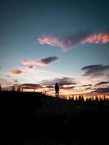 Preview wallpaper silhouette, sunset, solitude, clouds, hill, healy, united states