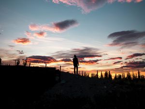 Preview wallpaper silhouette, sunset, solitude, clouds, hill, healy, united states