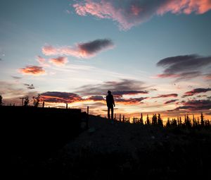 Preview wallpaper silhouette, sunset, solitude, clouds, hill, healy, united states