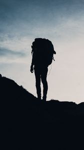 Preview wallpaper silhouette, tourist, hill, backpack