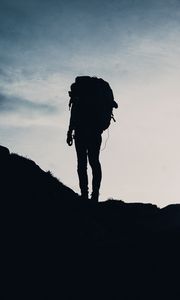 Preview wallpaper silhouette, tourist, hill, backpack