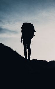 Preview wallpaper silhouette, tourist, hill, backpack