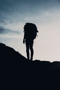 Preview wallpaper silhouette, tourist, hill, backpack