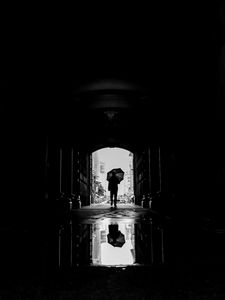 Preview wallpaper silhouette, umbrella, bw, passage, dark