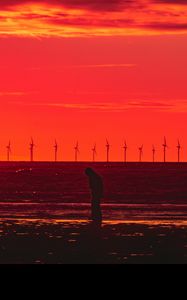 Preview wallpaper silhouette, wind turbines, sunset, horizon, red