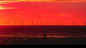 Preview wallpaper silhouette, wind turbines, sunset, horizon, red