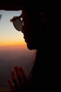 Preview wallpaper silhouette, window, porthole, flight