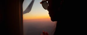 Preview wallpaper silhouette, window, porthole, flight