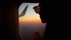 Preview wallpaper silhouette, window, porthole, flight