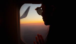 Preview wallpaper silhouette, window, porthole, flight