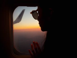 Preview wallpaper silhouette, window, porthole, flight