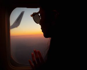 Preview wallpaper silhouette, window, porthole, flight