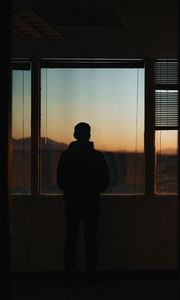 Preview wallpaper silhouette, window, sunset, loneliness, solitude