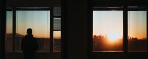 Preview wallpaper silhouette, window, sunset, loneliness, solitude