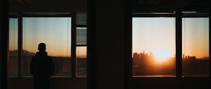 Preview wallpaper silhouette, window, sunset, loneliness, solitude