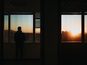 Preview wallpaper silhouette, window, sunset, loneliness, solitude