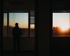 Preview wallpaper silhouette, window, sunset, loneliness, solitude
