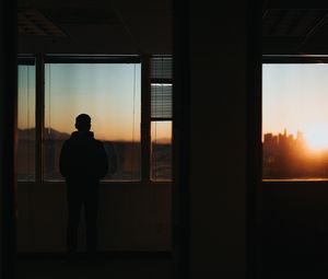 Preview wallpaper silhouette, window, sunset, loneliness, solitude