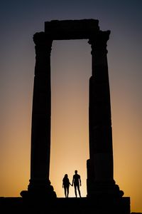 Preview wallpaper silhouettes, arch, columns, pair, dark, twilight