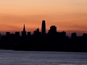 Preview wallpaper silhouettes, buildings, city, river, evening