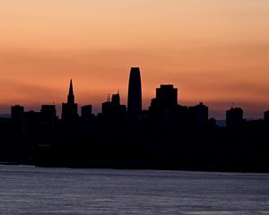 Preview wallpaper silhouettes, buildings, city, river, evening