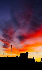 Preview wallpaper silhouettes, city, buildings, clouds, colorful, sunset, sky, dark