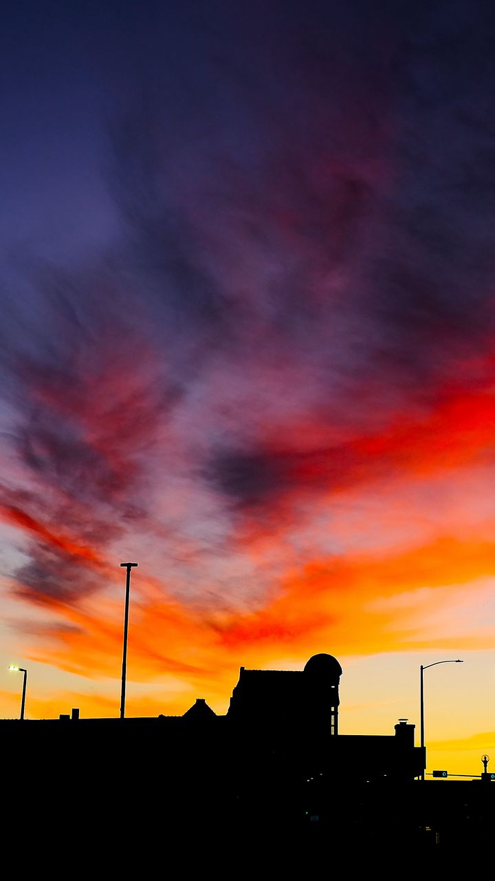 720x1280 Wallpaper silhouettes, city, buildings, clouds, colorful, sunset, sky, dark