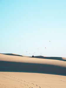 Preview wallpaper silhouettes, couple, desert, sand