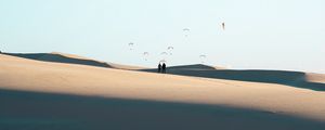 Preview wallpaper silhouettes, couple, desert, sand