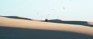 Preview wallpaper silhouettes, couple, desert, sand