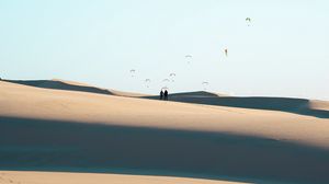 Preview wallpaper silhouettes, couple, desert, sand