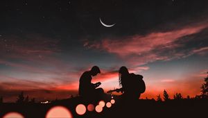 Preview wallpaper silhouettes, couple, guitar, sunset, romance, starry sky