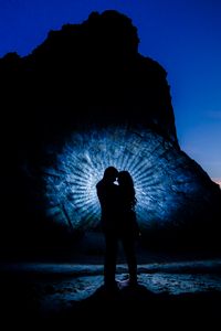 Preview wallpaper silhouettes, couple, love, rock, island