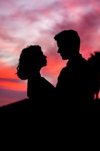 Preview wallpaper silhouettes, couple, love, romance, twilight, dark