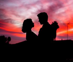 Preview wallpaper silhouettes, couple, love, romance, twilight, dark