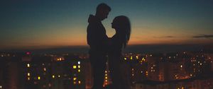 Preview wallpaper silhouettes, couple, romance, night city