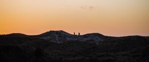 Preview wallpaper silhouettes, hill, horizon, sunset