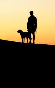 Preview wallpaper silhouettes, man, dog, sunset, hill