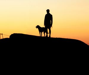 Preview wallpaper silhouettes, man, dog, sunset, hill