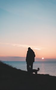 Preview wallpaper silhouettes, man, dog, friends, walk